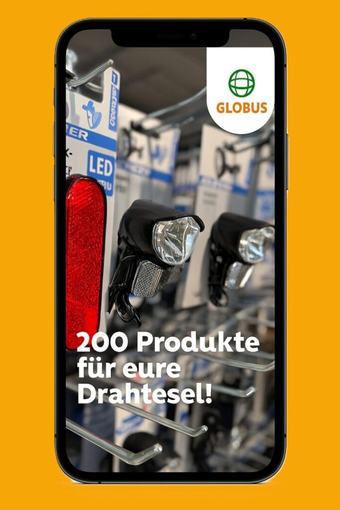 Smartphone screen showing bike lights on a display with bold German text '200 Produkte für eure Drahtesel!' and a Globus logo at the top right.